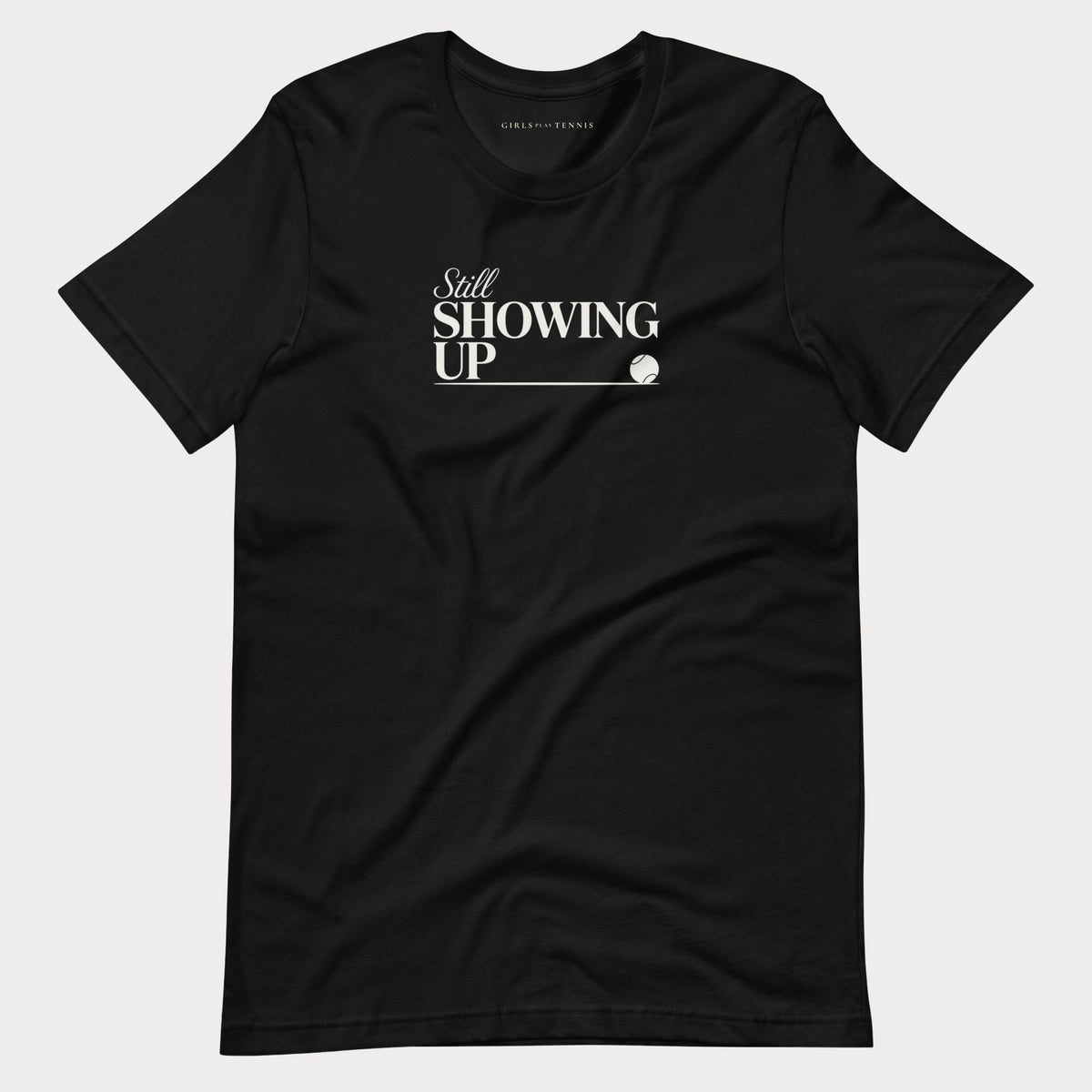 Black Still Showing Up women's tennis T-shirt with white lettering and a progress line ending in a tennis ball