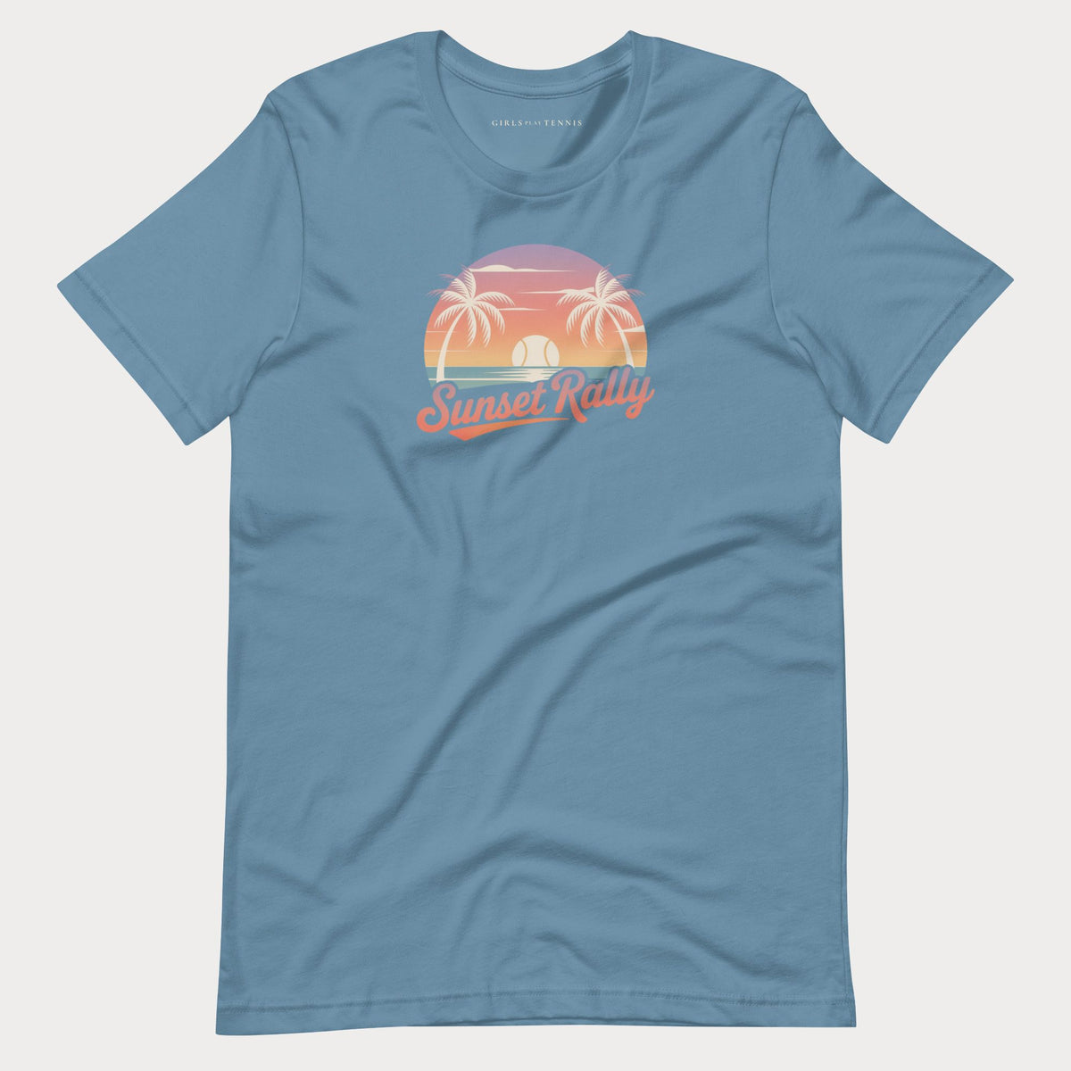 Steel blue Sunset Rally women's tennis T-shirt with a palm tree sunset and script lettering